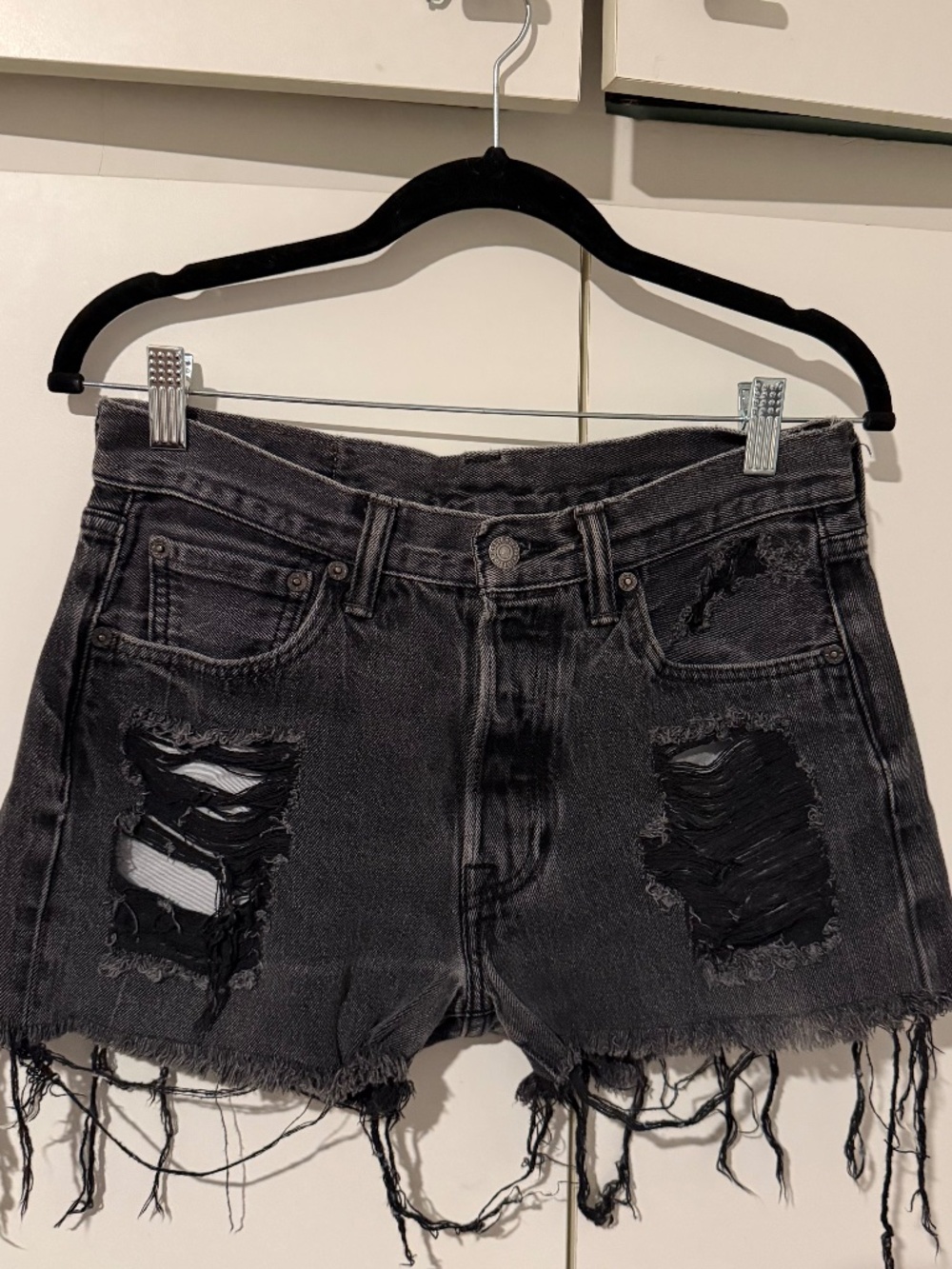 Distressed dark wash Levi shorts